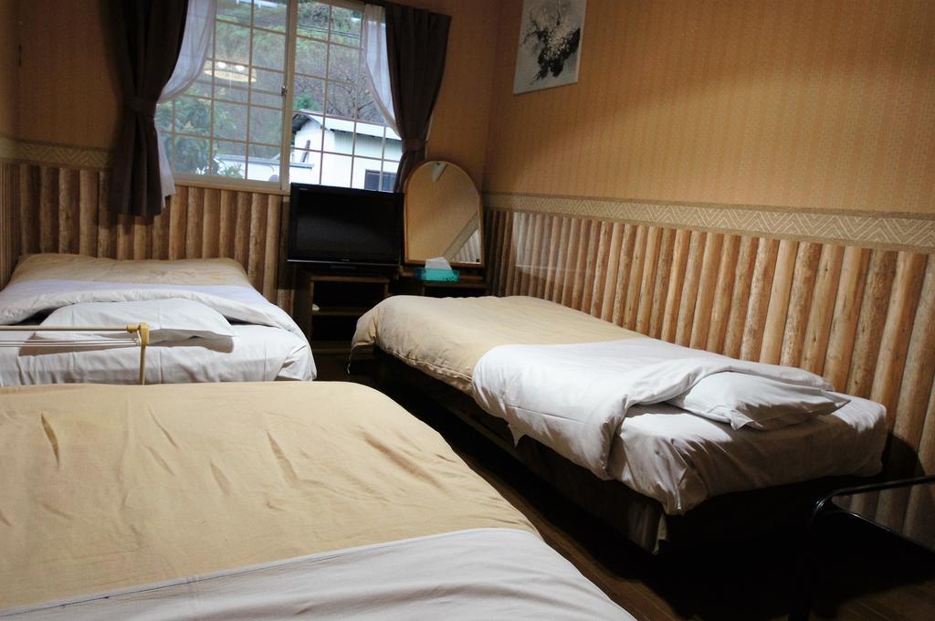 Biwa Monogatari Hotel Атами Екстериор снимка